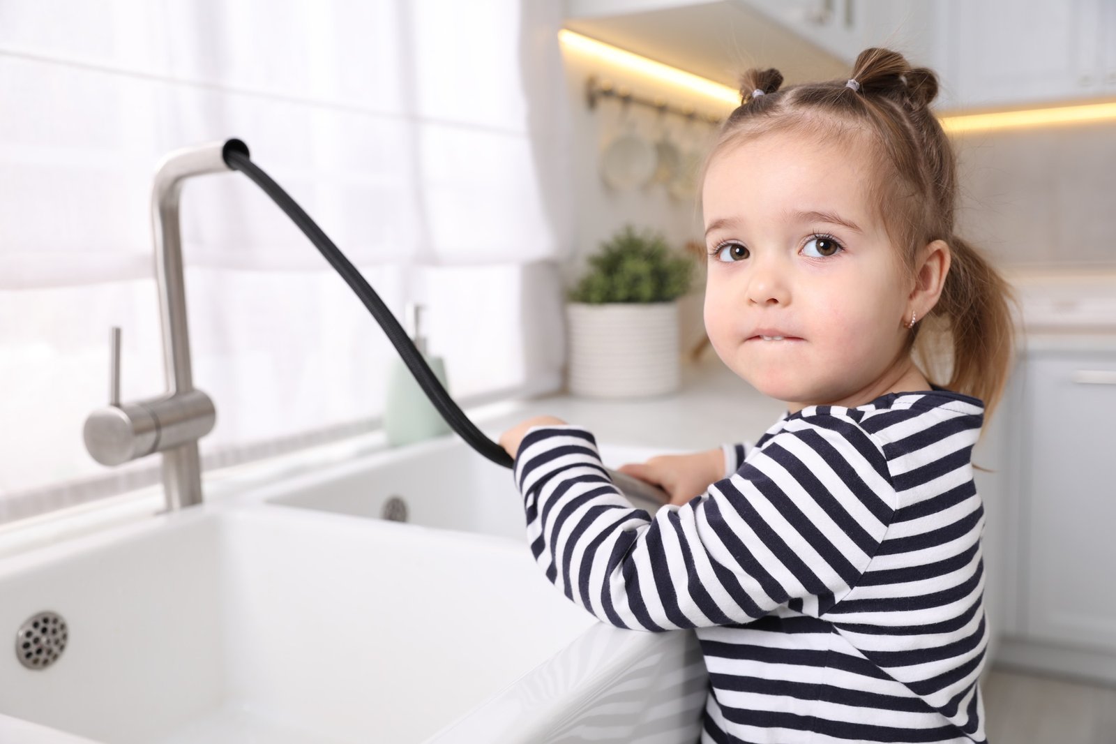Kindersicherung an einem Wasserhahn